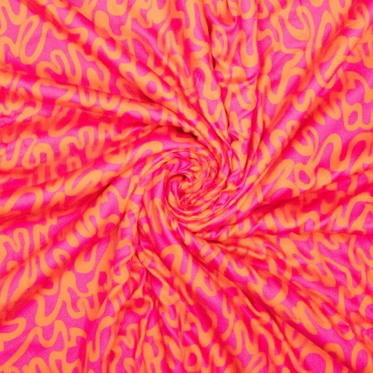 Pink and orange wavy patterned fabric swirled together