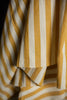Close-up of yellow and white striped fabric