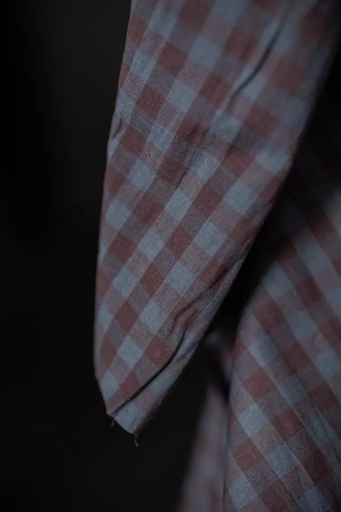 Close-up of a checkered fabric with a dark background