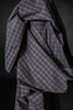 Close-up of a checkered fabric with a dark background