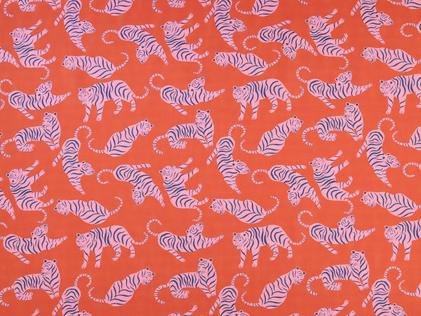 Pattern of pink tiger illustrations on an orange background