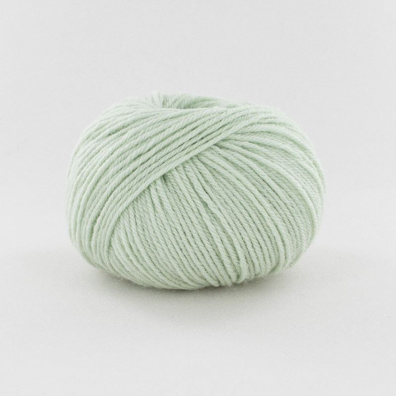 ball of pale sage green wool