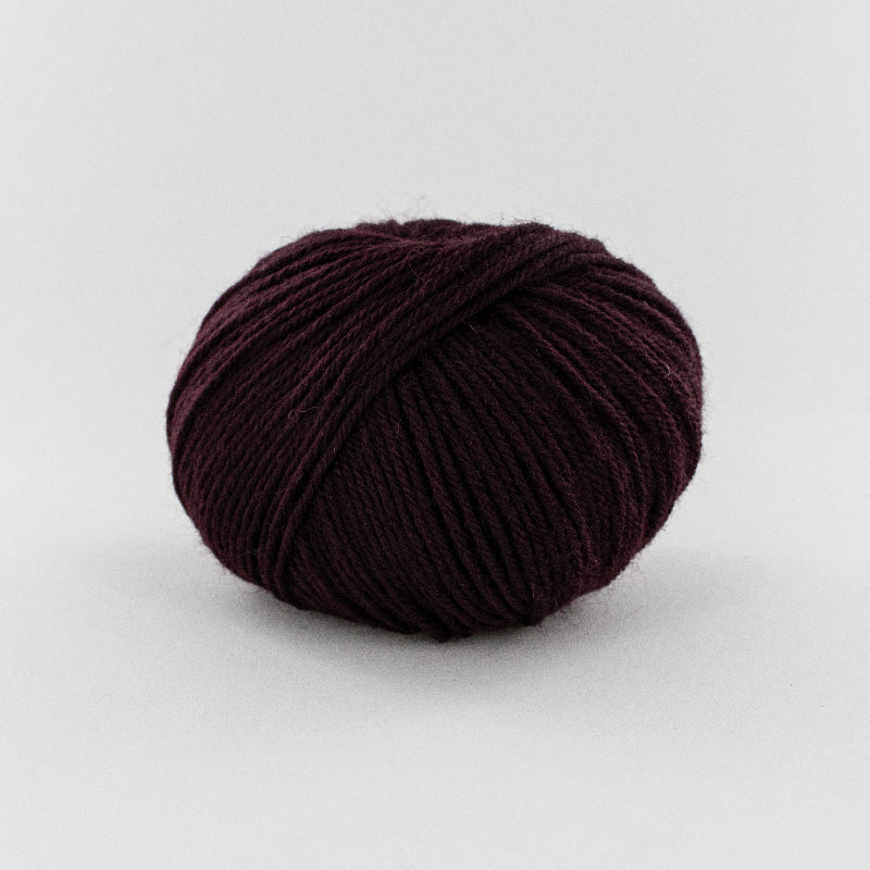 ball of aubergine purple wool