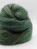Green skein of yarn on a white background