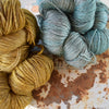 ginger's hand dyed yakety-yak 4ply merino yak and silk fingering weight sock weight shiny soft and drapey curry night and it might as well be spring gold and blue