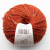 orange ball of tweed wool