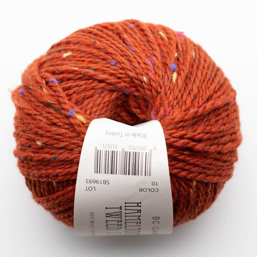 orange ball of tweed wool