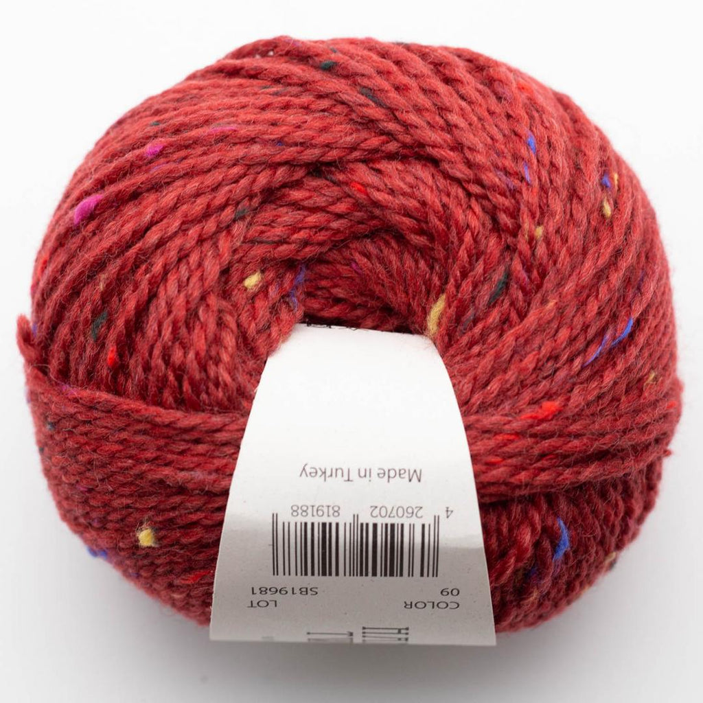 red ball of tweed wool
