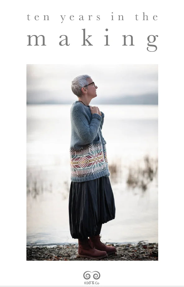 A cover image of a knitting pattern book titled '10 YEARS IN THE MAKING' featuring a photograph of a person wearing a knitted cardigan standing by water.