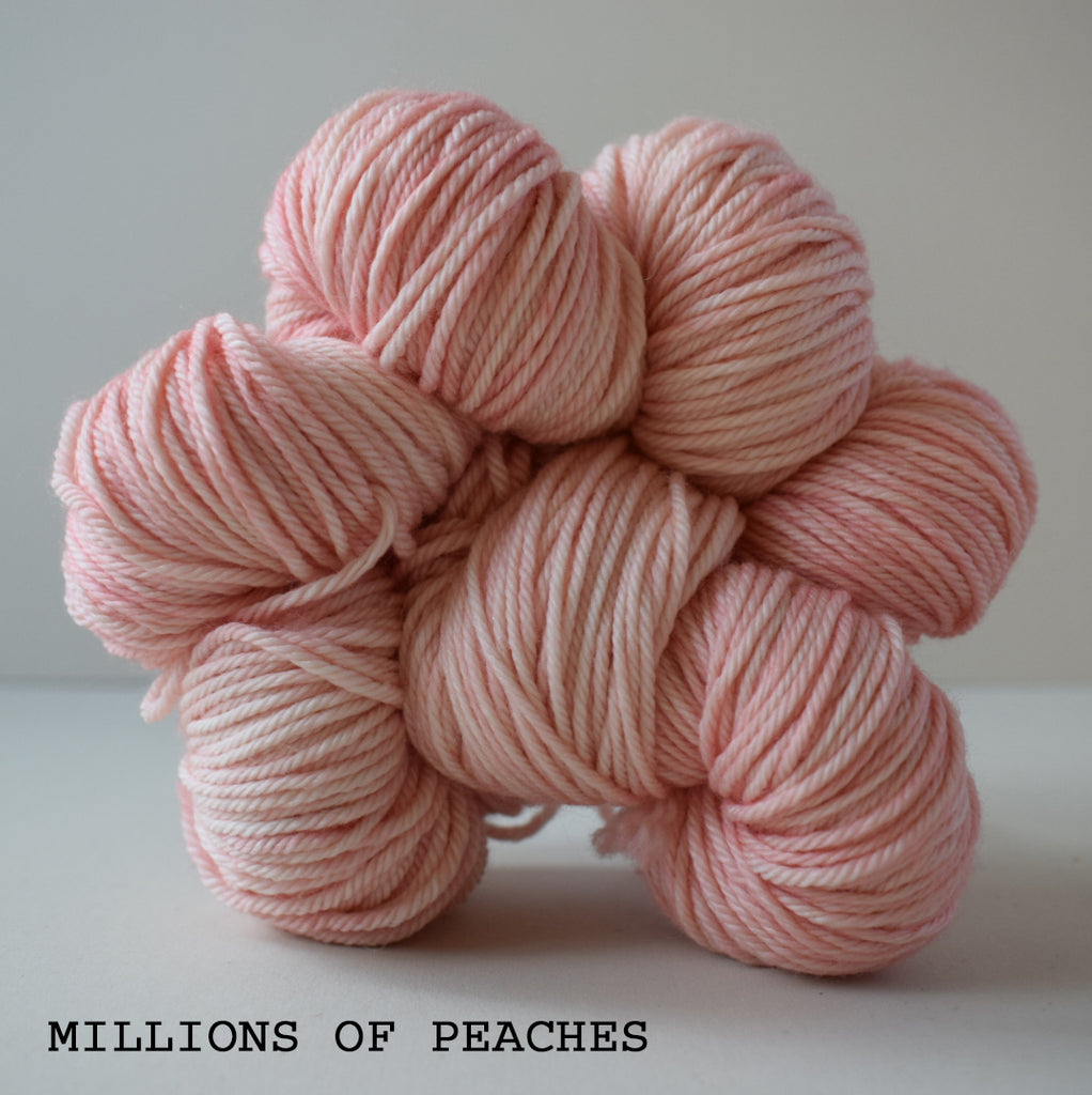 gingers hand dyed pep in your step worsted indie dyed superwash merino wool machine washable plump bouncy yarn indie dyed ginger twist studio millions of peaches peachy pink soft shade